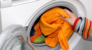 Filling a washing machine Filling a washing machine